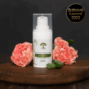 Care-E-Well Acne Gel bottle with pink flowers on wooden surface.