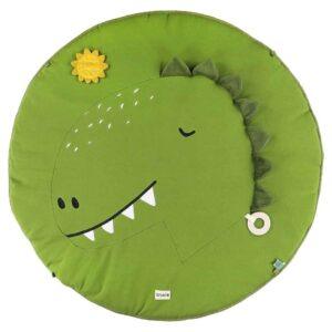 Round green activity play mat with dinosaur design and hanging toy.