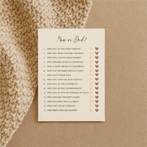 Baby shower game card titled 'Mom or Dad?' with questions and heart checkboxes.