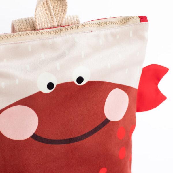 Kids backpack with a cute crab design, featuring eyes and a smiling face.