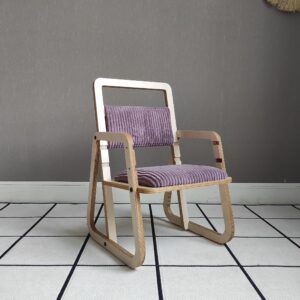 Adjustable children's chair Julle in Cannon Pink with purple cushion.