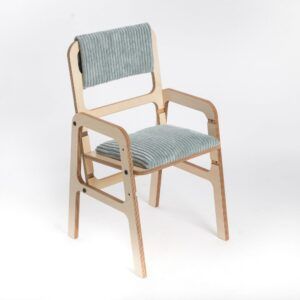 Adjustable children's chair with mint green cushion and wooden frame.