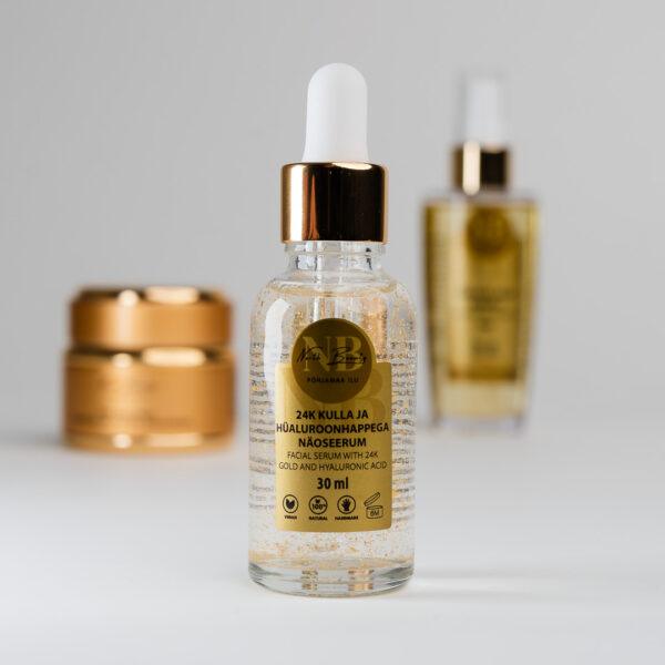 Hochwertiges Gesichtsserum mit 24K Gold und Hyaluronsäure in Glasflasche.